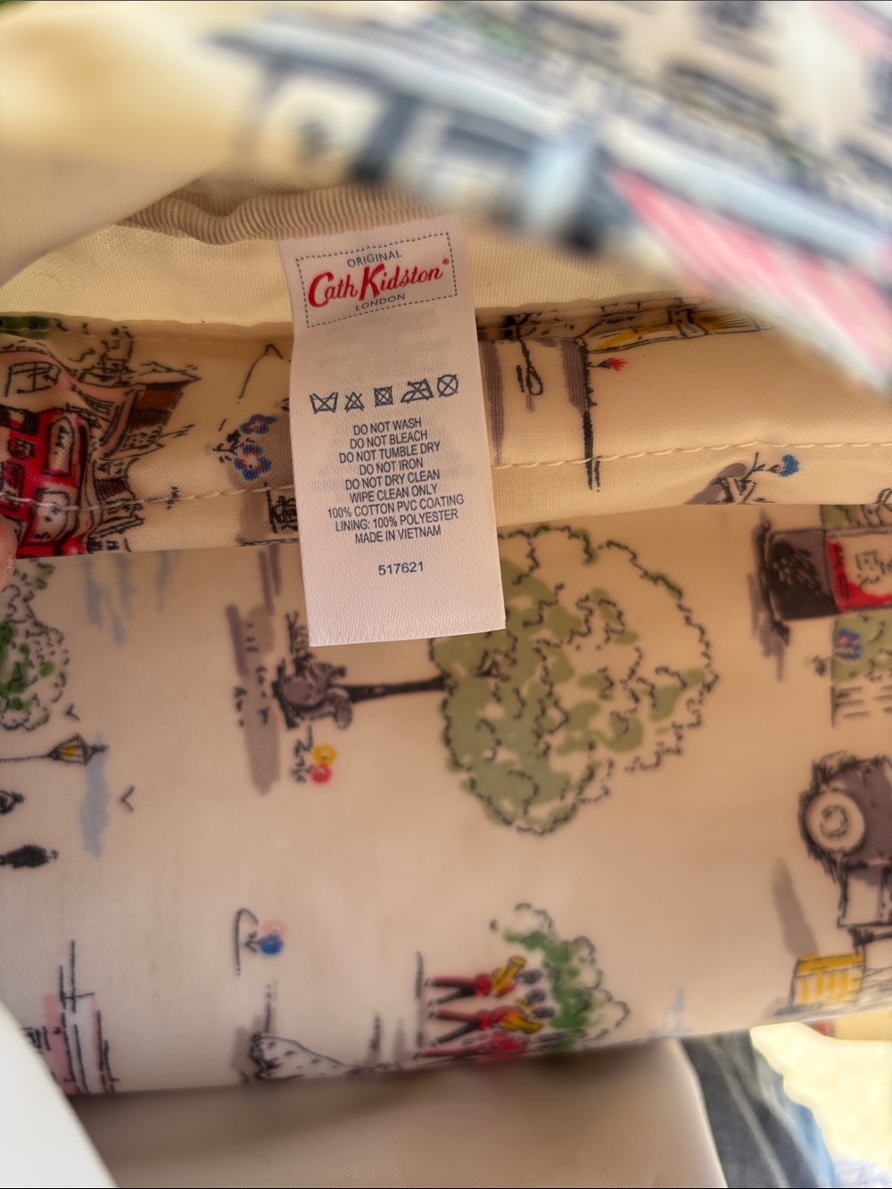 Cath Kidston Mattbackpack featuring whimsical Billie Town print. - Picture 7 of 10